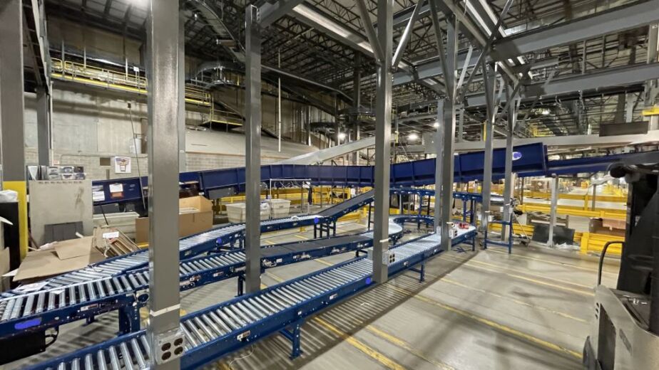 Distribution center conveyor installation by MJ Nester.